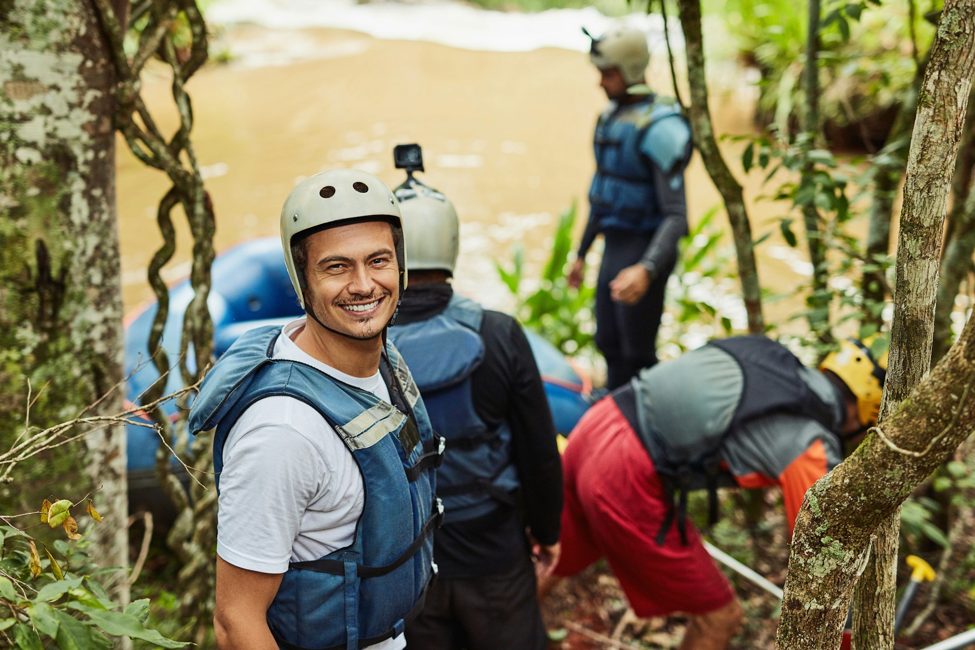 These moments are ones not easily forgotten...Shot of a group of young friends white water rafting.